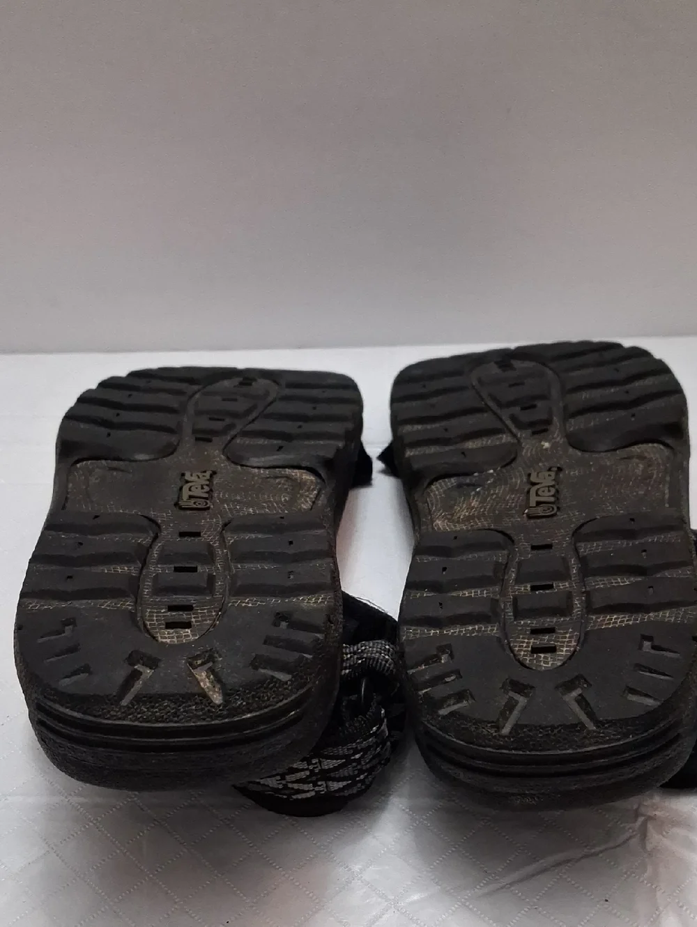 Teva Size 10 men's sandal in black, gray strap with velcro adjustable strap.